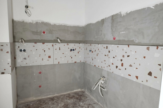 Kitchen wall while the building services connections were being made