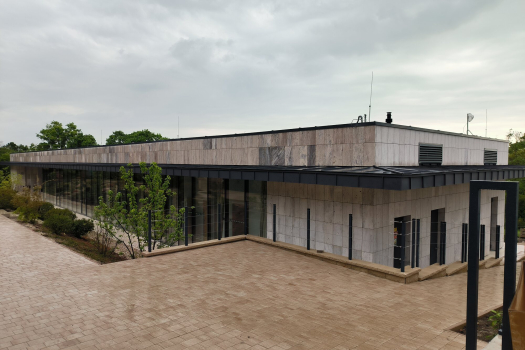 Completed facade and forecourt of the conference building