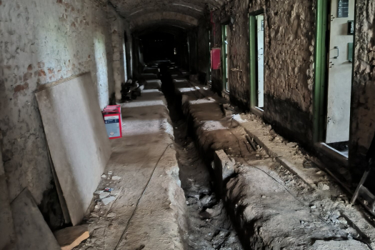Exposing the building services route in a vaulted section during demolition